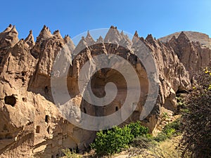 Aerial drone shot of the Fairy Chimneys over the landscape of Goreme, Cappadocia.