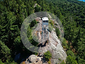 Aerial drone shot of firetower on the summit in the Adirondack Mountains