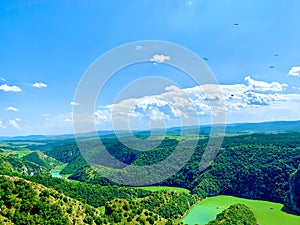 Aerial drone shot of the gorgeous canyon river Uvac in Sjenica, Serbia photo