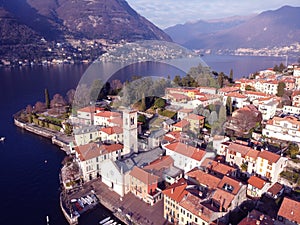 Aerial drone shot of historic harbor of Como Lake, Italy