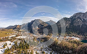 Aerial drone shot of Hohenschwangau in Fussen with view of Neuschwanstein castle in Germany winter