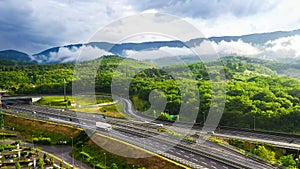 Aerial Drone Shot: Long Haul Semi Trucks Driving on the Busy Highway in the Rural Region of Italy