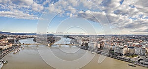 Aerial drone shot of Margret Bridge over Danube in Budapest winter morning with overcast