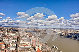 Aerial drone shot of Margret Bridge over Danube in Budapest winter noon with clouds