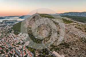 Aerial drone shot of Mountain Srd with view of Dubrovnik in Croatia summer morning