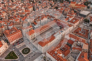 Aerial drone shot of Republic Square in Split old town in sunrise hour in Croatia