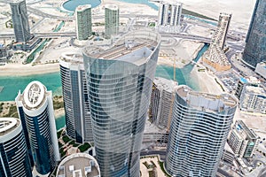 Aerial drone shot of skyscrapers and towers in the city - Abu Dhabi Al Reem island towers