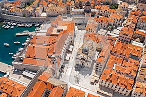 Aerial drone shot of St. Blaise Church in luzar square Stradun street in Dubrovnik old town in Croatia summer