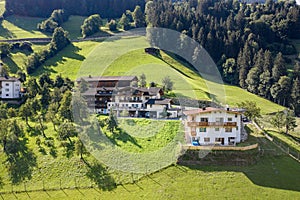 Aerial drone shot of typical houses in Zillertal valley Austria summer photo