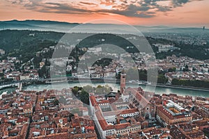 Aerial drone shot view of Veronetta Colline and Castel San Pietro with Adige river during sunrise photo