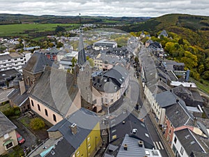 Aerial Drone Shot in Wiltz Luxembourg. View on a Castle at cloudy autumn day in Wiltz