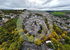 Aerial Drone Shot in Wiltz Luxembourg. View on a Castle at cloudy autumn day in Wiltz