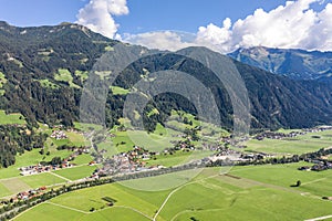Aerial drone shot of Zillertal valley with clouds in Tyrol Austria summer photo