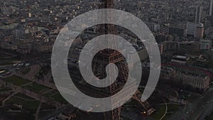 AERIAL: Drone Slowly Circling Eiffel Tower, Tour Eiffel in Paris, France with view on Seine River in Beautiful Sunset