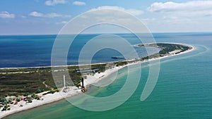 Aerial drone top down photo of seascape of island with sandy beach, turquoise clear waters of black sea in Ukraine