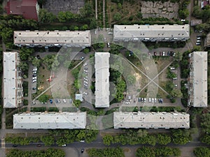 Aerial drone top down shot of downtown with houses and square courtyards. Magnitogorsk, Russia