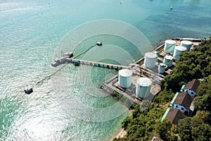 Aerial drone top view of containers cargo ship at industrial import-export port. Business logistic import and export freight