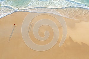 Aerial drone top view crowd of happy people relax at tropical Beach with sunset in Phuket, Thailand, Beautiful Phuket beach is