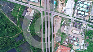 Aerial drone top view of highway junction road Bridge with moving cars Active movement of transport cars vehicles in different dir