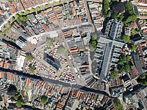 Aerial drone video of the city of Gouda's downtown city center, Sint Janskerk, St. John's Church, and City Hall.