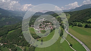 Aerial drone video of the city of VÃ¶ls am Schlern Fie allo Sciliar  on the Italian Alps Dolomites