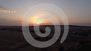 Aerial drone video at sunset with crop fields from Arapiles, Salamanca