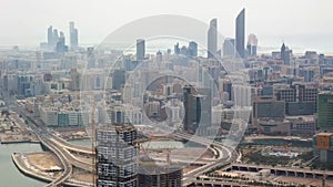 Aerial drone view of Abu Dhabi city skyline, famous towers and skyscrapers