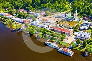 Aerial drone view of ancient russian town Ples with Church of the Ressurection on the Volga river photo