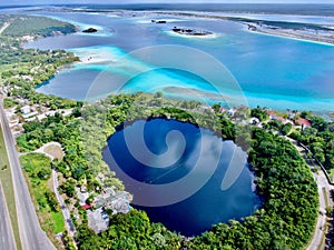Aerial drone view of Bacalar in Mexico and blue cenote