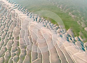 Aerial drone view of Baie de Somme large estuary in France at golden hour