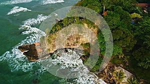 Aerial drone view of Beach and Its Wonderful Sunset View. At anyer beach with noise cloud. Banten, Indonesia, March 3, 2021