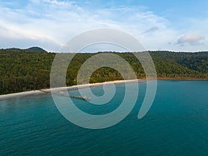 Aerial drone view of beautiful beach with turquoise sea water and palm trees of Gulf of Thailand. Kood island, Thailand.
