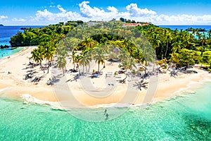 Aerial drone view of beautiful caribbean tropical island Cayo Levantado beach with palms. Bacardi Island, Dominican Republic.