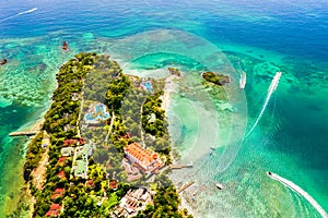 Aerial drone view of beautiful caribbean tropical island Cayo Levantado with palms. Bacardi Island, Dominican Republic. Vacation