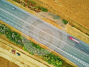 Aerial drone view of beautiful French countryside and six-lane motorway