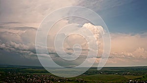 Aerial drone view. Big white cloud. Coming hard thunderstorm