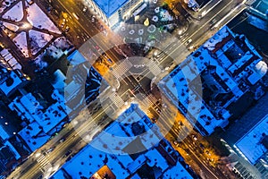Aerial drone view on city intersection during winter night
