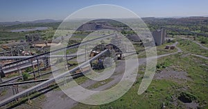 An aerial drone view of a closed, abandoned mine ore processing plant