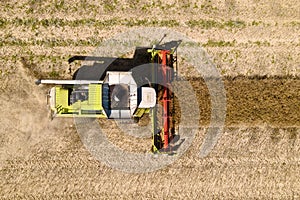 aerial drone view of a combine harvester