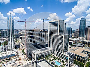 Aerial drone view of Construction crane building new skyscrapers in Austin Texas