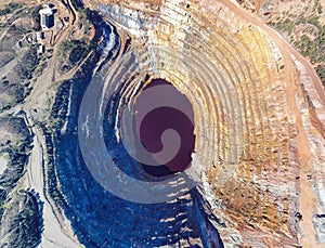 Aerial drone view of Corta Atalaya with mining levels at open mine pit.