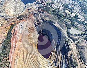 Aerial drone view of Corta Atalaya with mining levels at open mine pit.