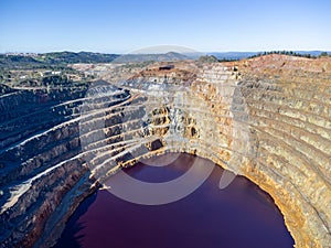 Aerial drone view of Corta Atalaya with mining levels at open mine pit.