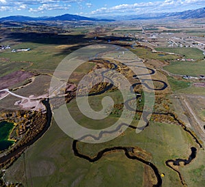 Aerial Drone View of Creek River Waterway in Meadow Field