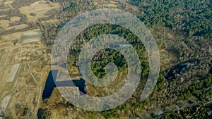 Aerial drone view of deforestation of a pine forest. Ecology concept change tree forest drought and forest refreshing.