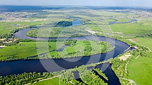 Aerial drone view of Dnieper and Dniester river near Kyiv, green islands from above, river landscape in spring, Ukraine