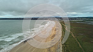 aerial drone view of the dunes of Tramore, Waterford Ireland. Sandhills natural park