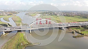 Aerial drone view of dutch infrastructure highway overpass over waterway river, Jan Blankenbrug A2 highway under