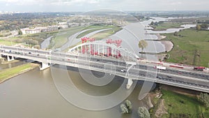 Aerial drone view of dutch infrastructure highway overpass over waterway river, Jan Blankenbrug A2 highway under