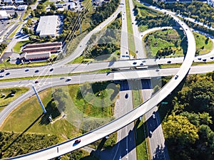 Aerial drone view of elevated road and traffic junctions. Transport highway. Modern construction design of traffic ways to avoid